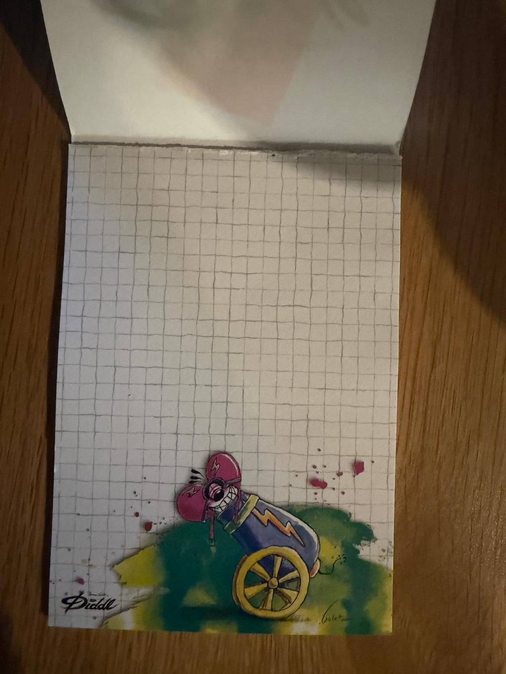 Diddl Block A6 Nr. 42 – Innenseite, kariertes Blatt mit Diddl-Maus an einer Kanone